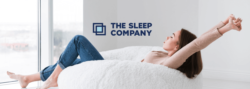 The Sleep Company logo - pioneer in SmartGRID mattresses for ultimate comfort.  
